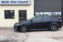 Black 2017 Mitsubishi Lancer with premium window film